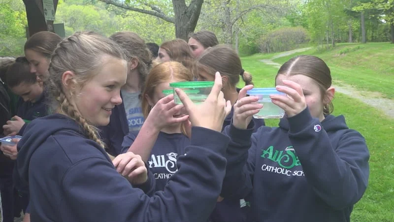 Students Make A Splash: Releasing Endangered Salmon Into Kenduskeag Stream